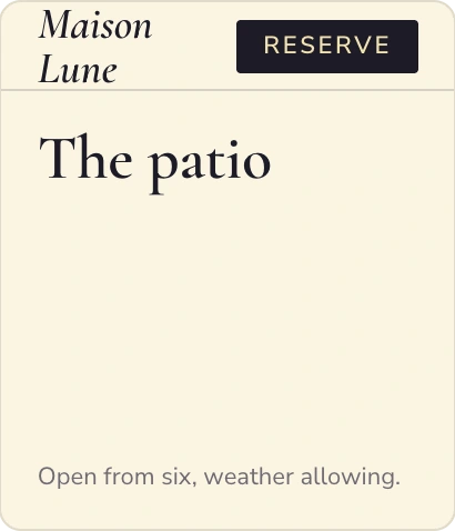 Maison Lune's Patio page, where the empty photo slot fills with a candlelit terrace photo.