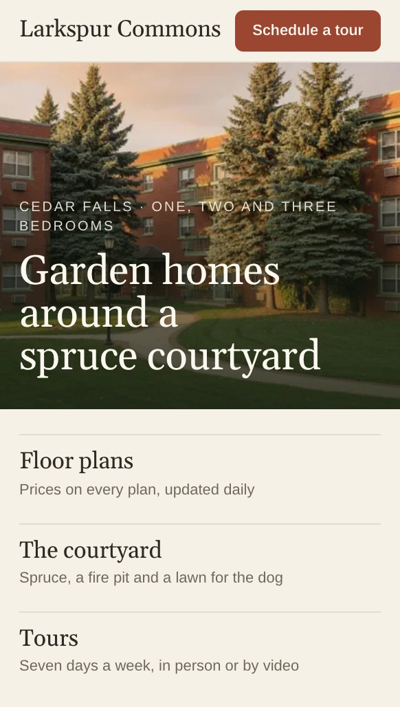Larkspur Commons's home page, with the headline Garden homes around a spruce courtyard over a courtyard photo.